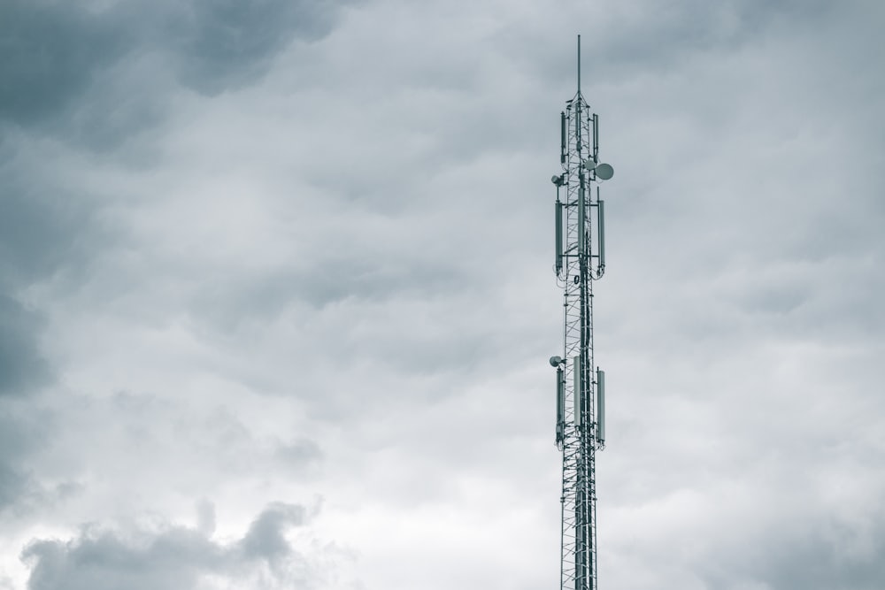 Radio telecommunications tower against a cloudy sky