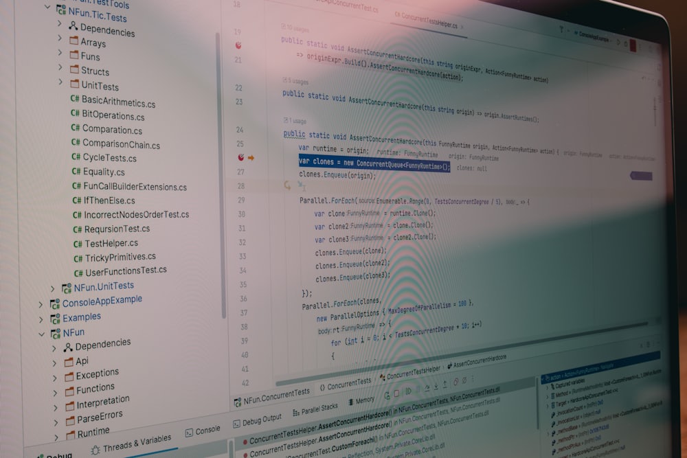 Laptop screen showing lines of code in an editor